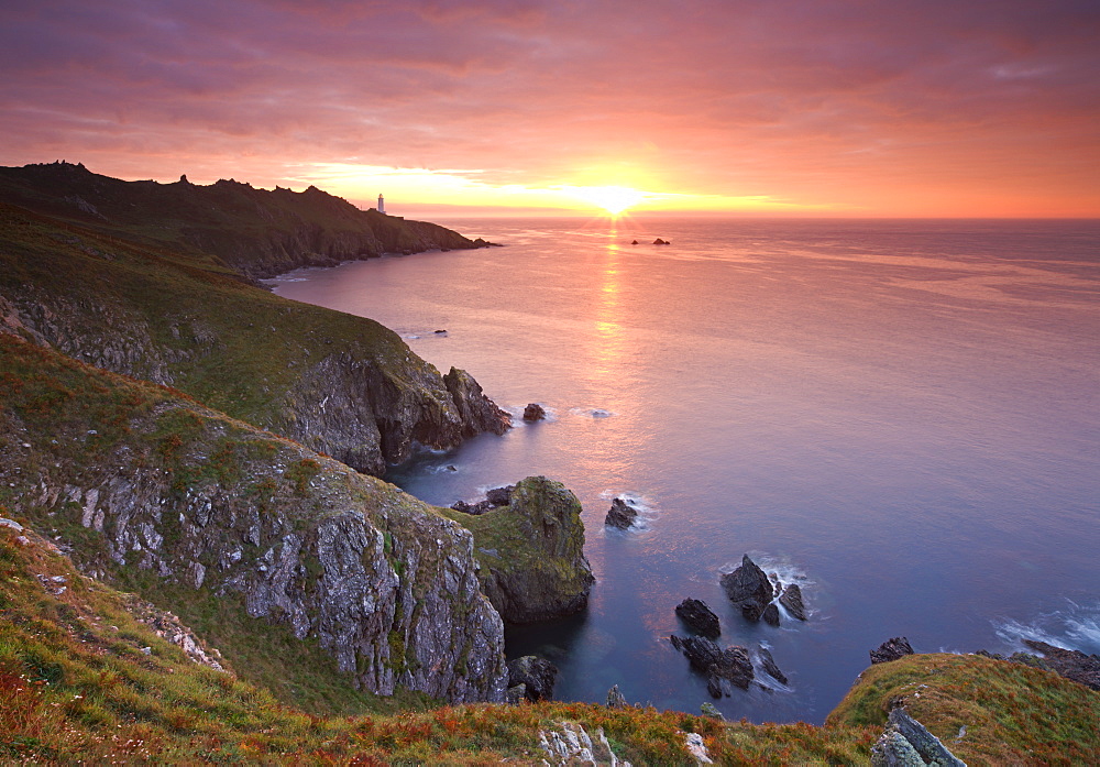 Spectacular sunrise behind Start Point Lighthouse in South Hams, Devon, England, United Kingdom, Europe