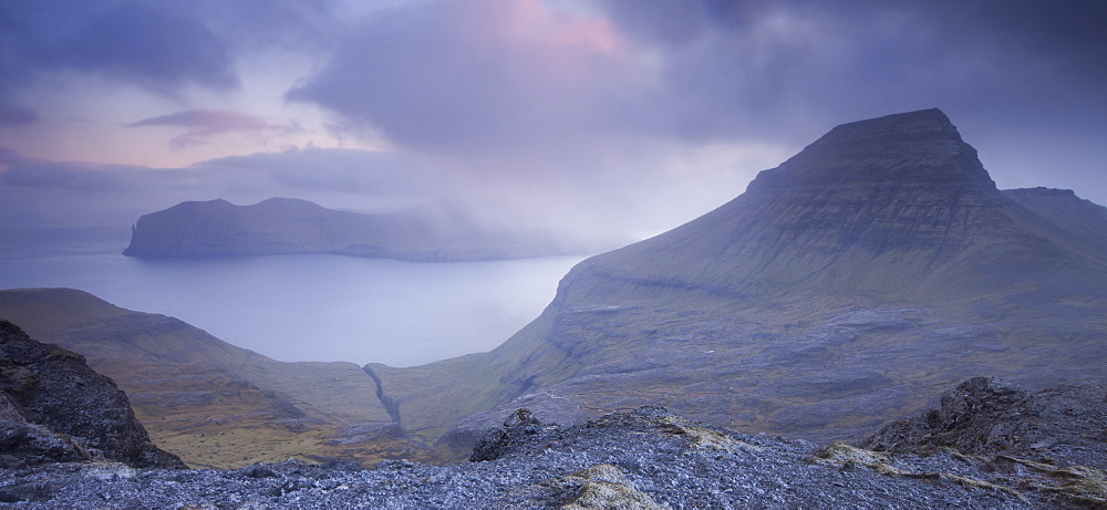 Mountain vista overlooking Skaelingur mountain and Vagar island in the background, Streymoy, Faroe Islands, Denmark, Europe