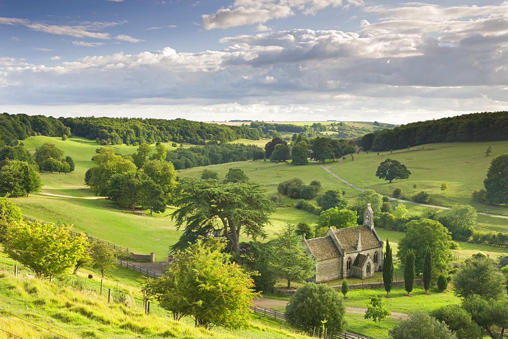 Church of St. Mary the Virgin surrounded by beautiful countryside, Lasborough in the Cotswolds, Gloucestershire, England, United Kingdom, Europe 