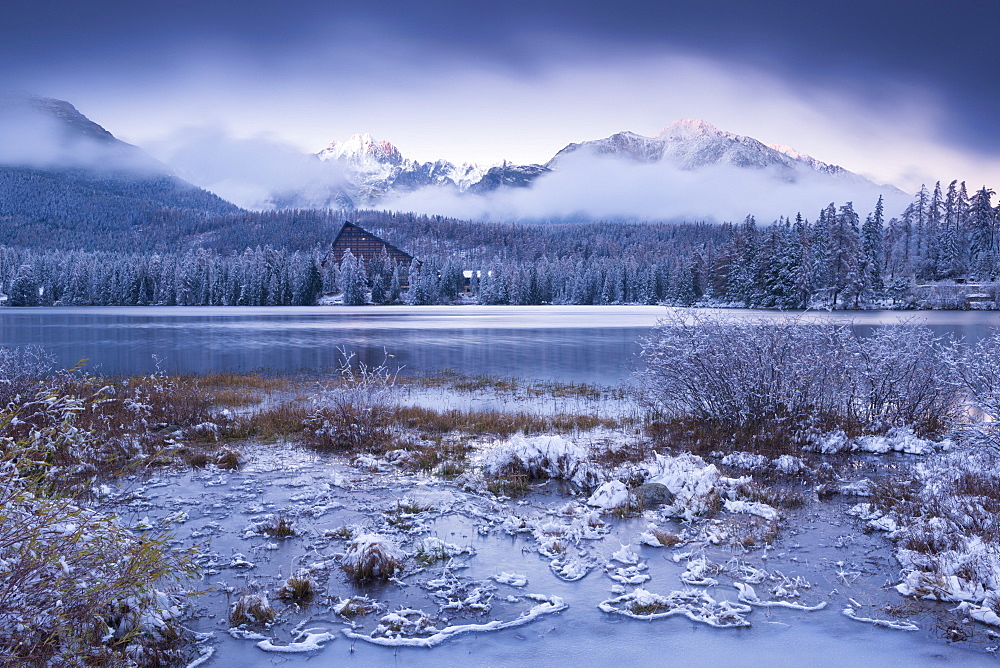 Winter snow and ice at Strbske Pleso in the High Tatras in winter, Slovakia, Europe 