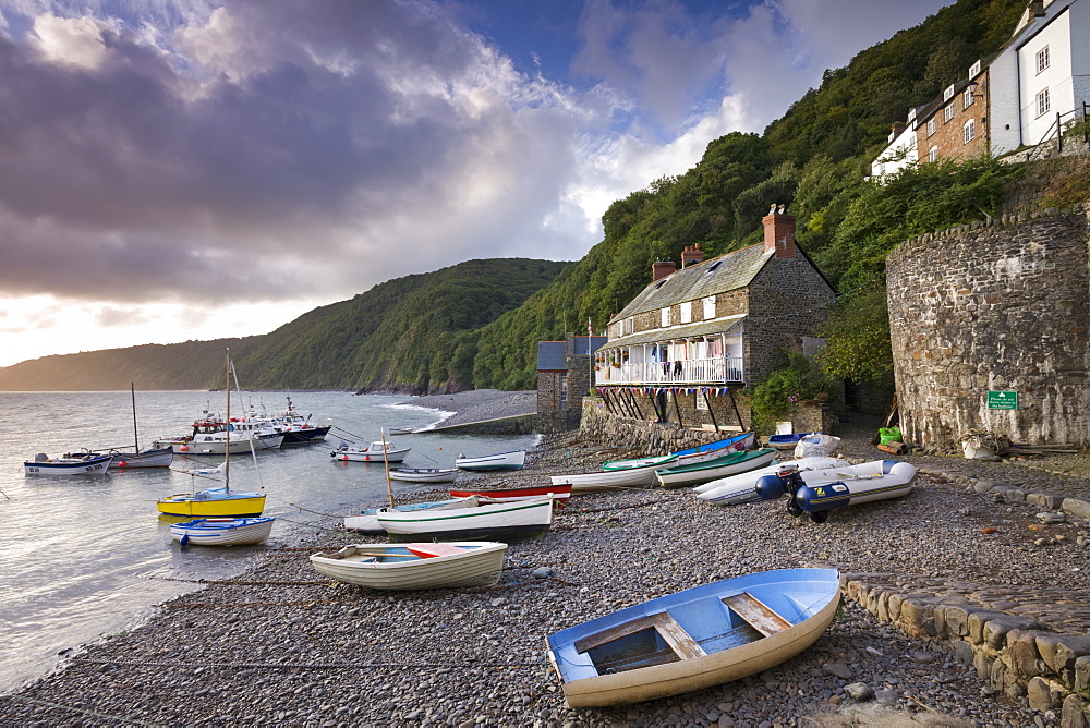 Fishing boats on the pebble beach in Clovelly harbour at dawn, Devon, England, United Kingdom, Europe