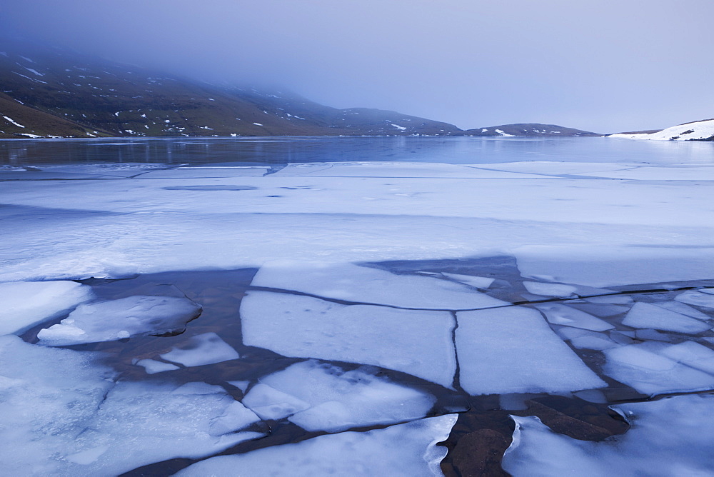 Broken ice on the surface of Llyn y Fan Fawr in the Black Mountains, Brecon Beacons National Park, Wales, United Kingdom, Europe 