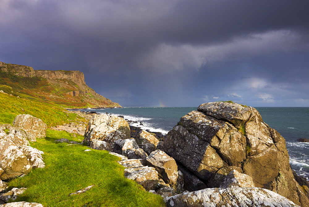 Stormy skies over Fair Head on the Causeway Coast, County Antrim, Ulster, Northern Ireland, United Kingdom, Europe