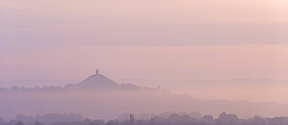 Glastonbury Tor on a misty morning in summer, Somerset, England, United Kingdom, Europe 