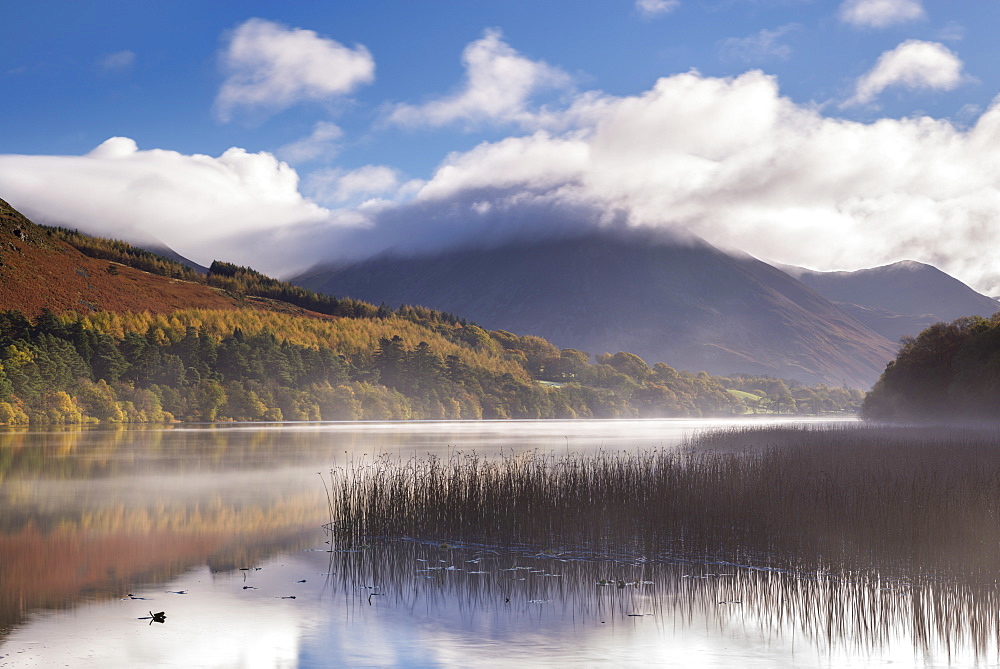 Mist clears over Loweswater on a beautiful autumn morning, Lake District National Park, Cumbria, England, United Kingdom, Europe