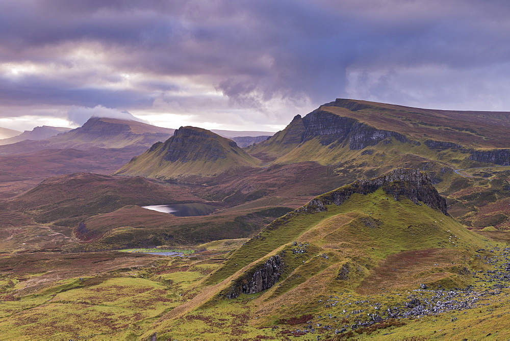 Dawn over the Trotternish mountain range, viewed from the Quiraing, Isle of Skye, Inner Hebrides, Scotland, United Kingdom, Europe