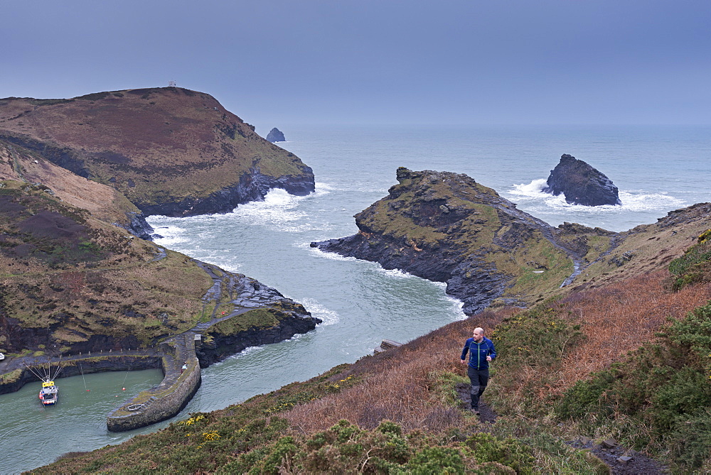 Runner on the coastal footpath at Boscastle, Cornwall, England, United Kingdom, Europe