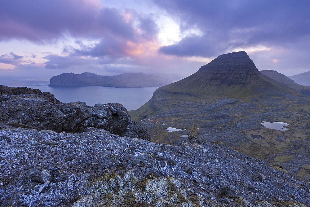 Sunset over the rugged mountains of Streymoy, Faroe Islands, Denmark, Europe