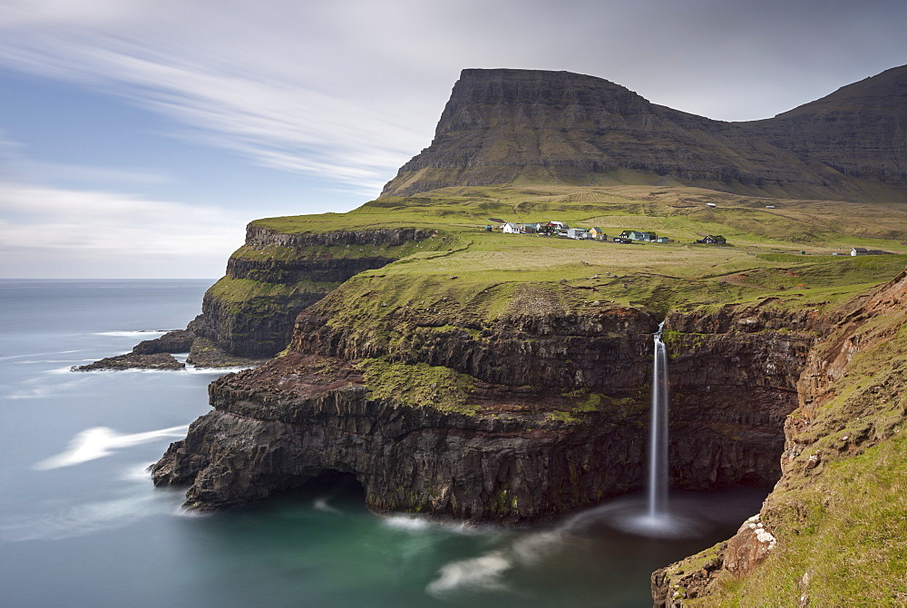 Beautiful coastal scenery beside the village of Gasadalur on the island of Vagar, Faroe Islands, Denmark, Europe