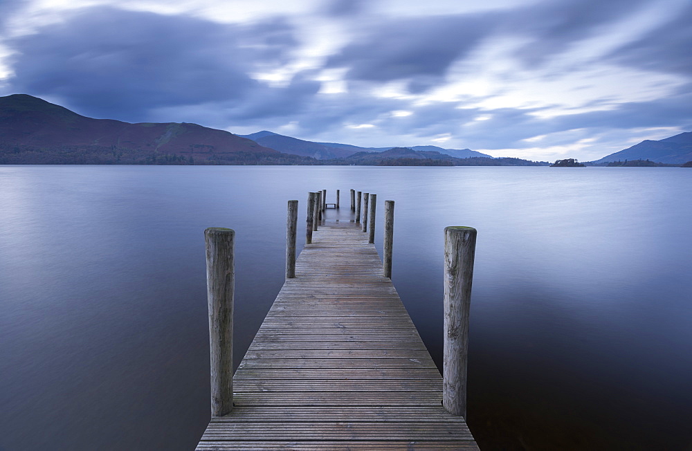 Wooden jetty on Derwent Water in autumn, Lake District National Park, Cumbria, England, United Kingdom, Europe