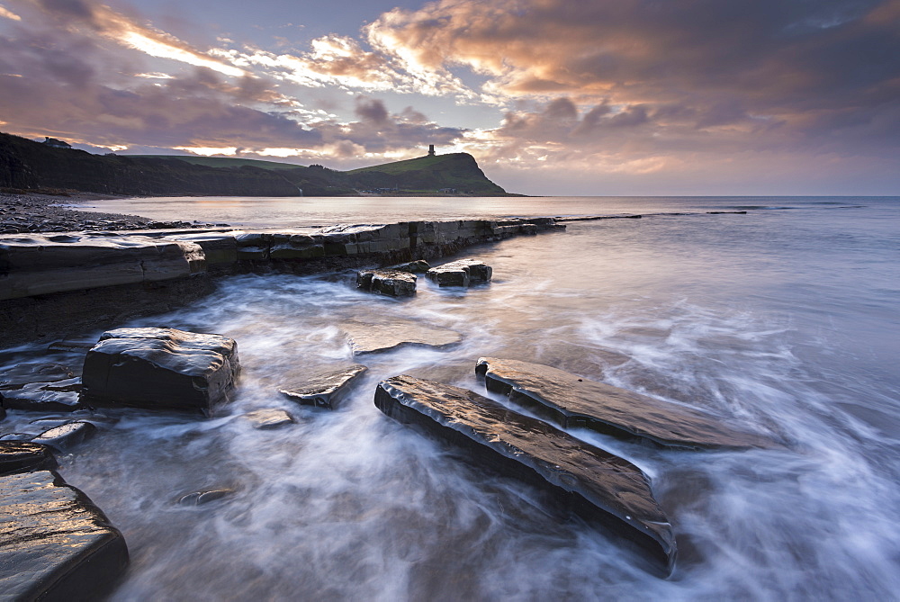 Winter sunrise over Clavell Tower from Kimmeridge Bay on the Jurassic Coast, UNESCO World Heritage Site, Dorset, England, United Kingdom, Europe