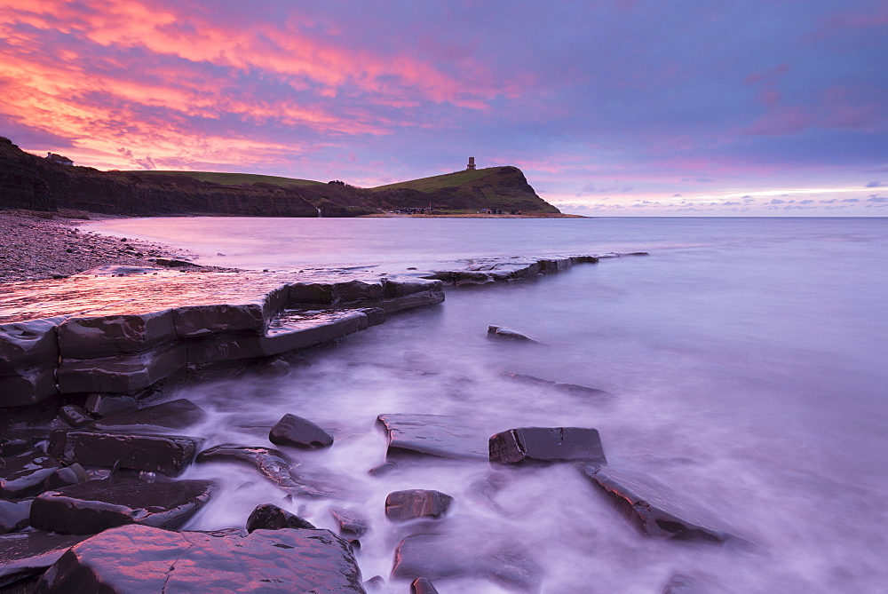 Colourful dawn sky above Kimmeridge Bay in winter, on the Jurassic Coast, UNESCO World Heritage Site, Dorset, England, United Kingdom, Europe