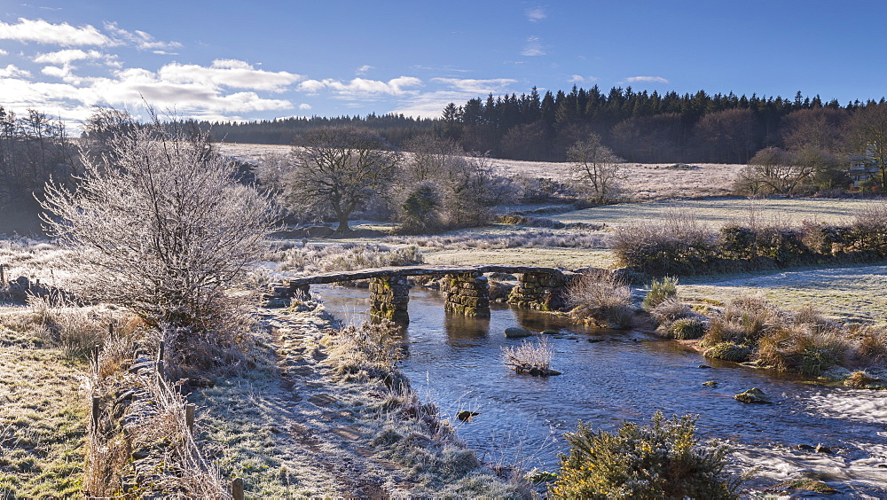 Frosty winter conditions at the old clapper bridge at Postbridge, Dartmoor, Devon, England, United Kingdom, Europe