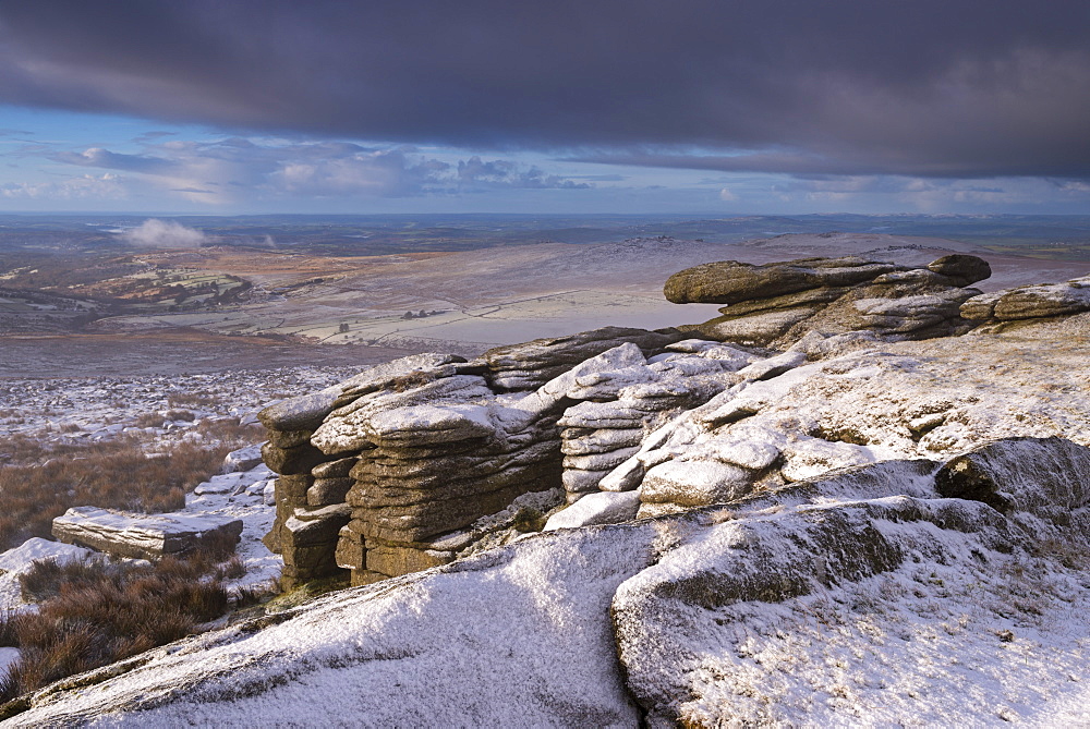 Snow covered granite rocks at Great Mis Tor in winter, Dartmoor National Park, Devon, England, United Kingdom, Europe