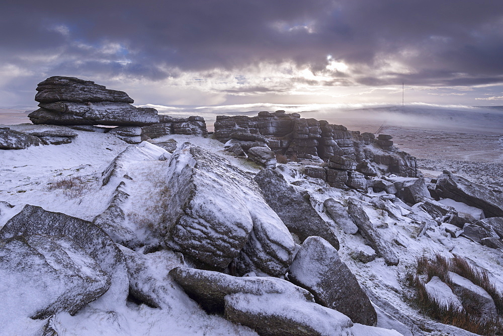 Snow covered granite rocks at Great Mis Tor in winter, Dartmoor National Park, Devon, England, United Kingdom, Europe