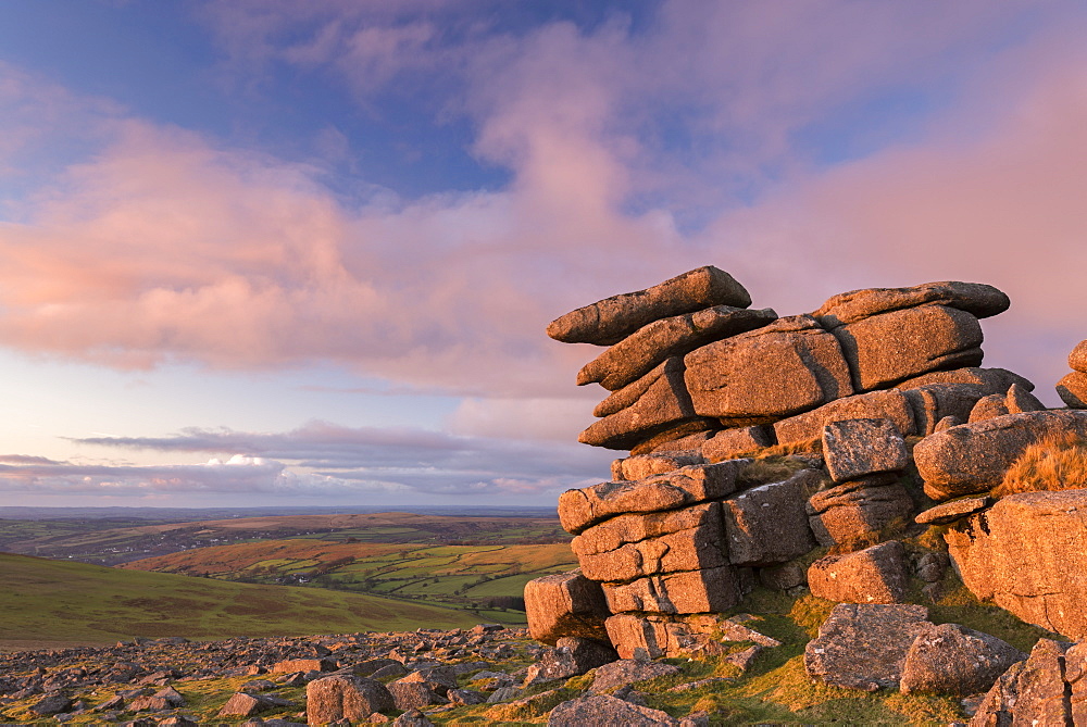 Evening sunlights glows against Great Staple Tor, Dartmoor National Park, Devon, England, United Kingdom, Europe