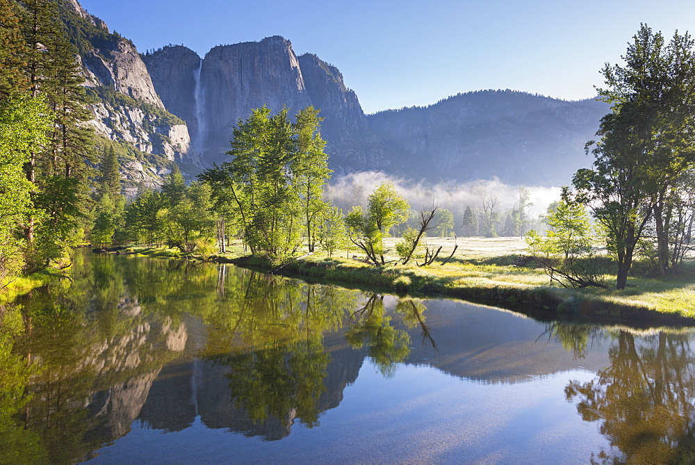 Yosemite Falls and the Merced River at dawn on a misty Spring morning, Yosemite Valley, UNESCO World Heritage Site, California, United States of America, North America