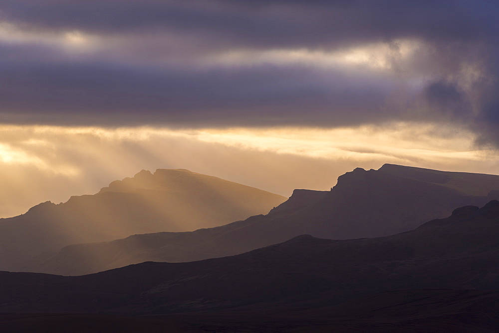 Rich morning sunlight over the Trotternish mountain range, Isle of Skye, Inner Hebrides, Scotland, United Kingdom, Europe