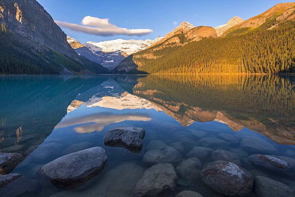 Early morning sunlight at Lake Louise in the Canadian Rockies, Banff National Park, UNESCO World Heritage Site, Alberta, Canada, North America