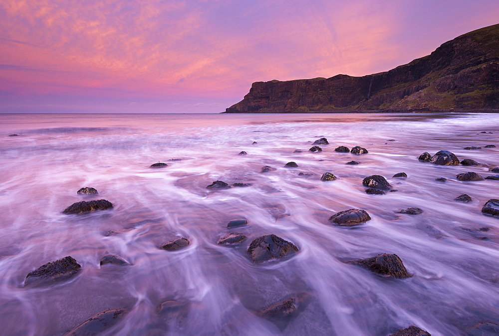 Colourful pink sunrise above Talisker Bay, Isle of Skye, Inner Hebrides, Scotland, United Kingdom, Europe