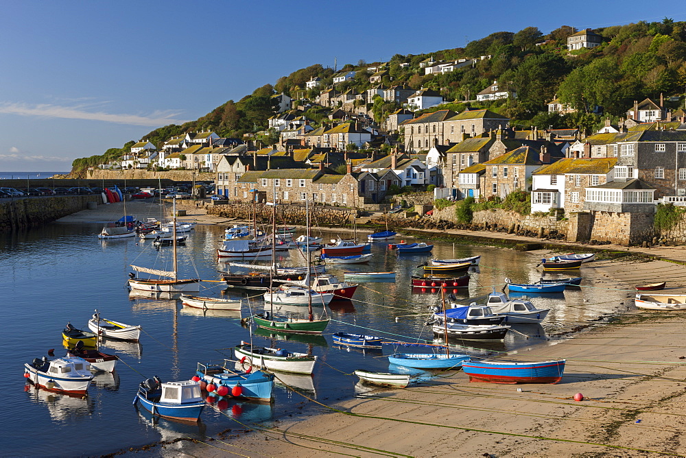 Colourful boats crowd Mousehole harbour, Cornwall, England, United Kingdom, Europe