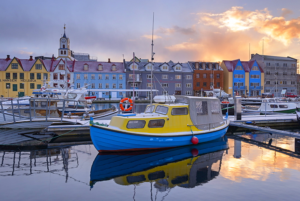 Boats in Torshavn harbour at sunrise, Faroe Islands, Denmark, Europe