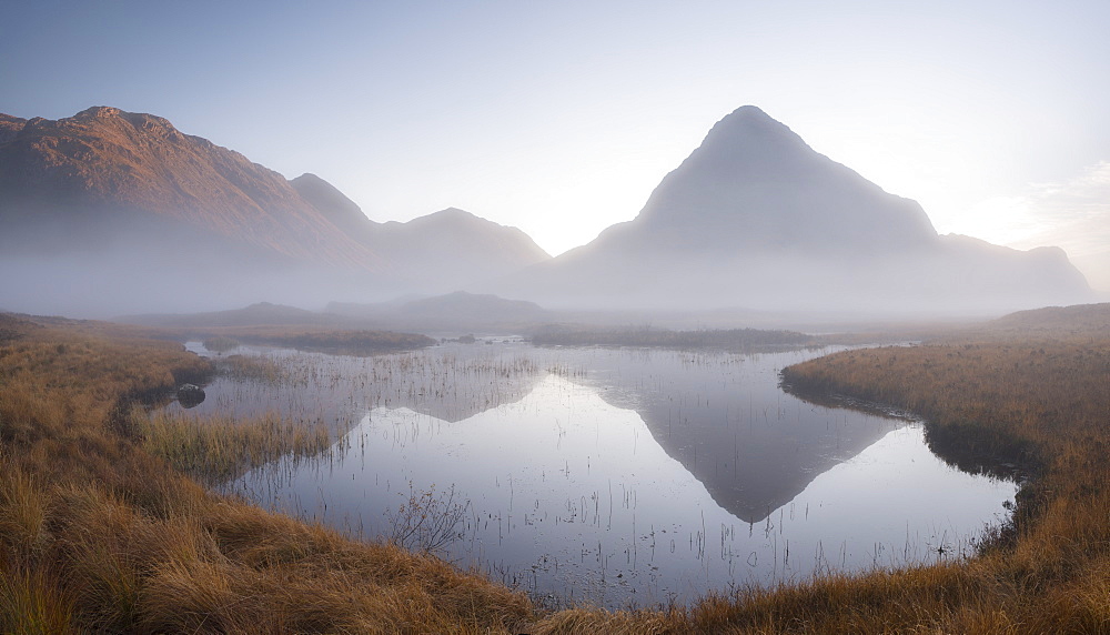 Evening mist shrouds Buachaille Etive Beag mountain on Rannoch Moor, Highland, Scotland, United Kingdom, Europe