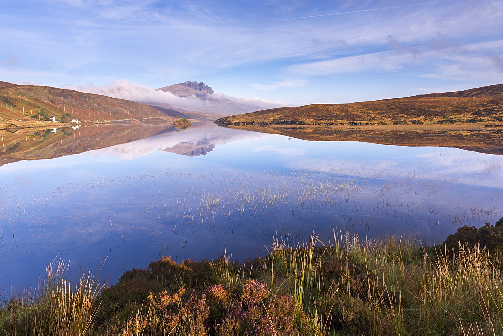 Perfect reflections at Loch Fada on the Isle of Skye, Inner Hebrides, Scotland, United Kingdom, Europe