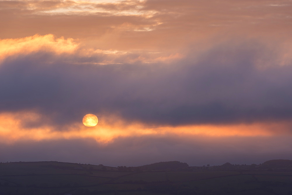 Atmospheric sunrise over Dartmoor National Park, Devon, England, United Kingdom, Europe