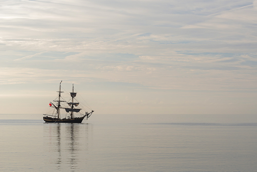 Period wooden sailing ship off the Cornish coast, Cornwall, England, United Kingdom, Europe