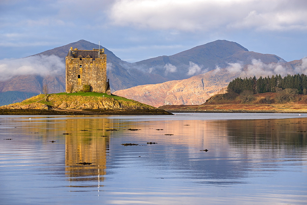 Castle Stalker reflected in Loch Linnhe in winter, Scottish Highlands, Scotland, United Kingdom, Europe