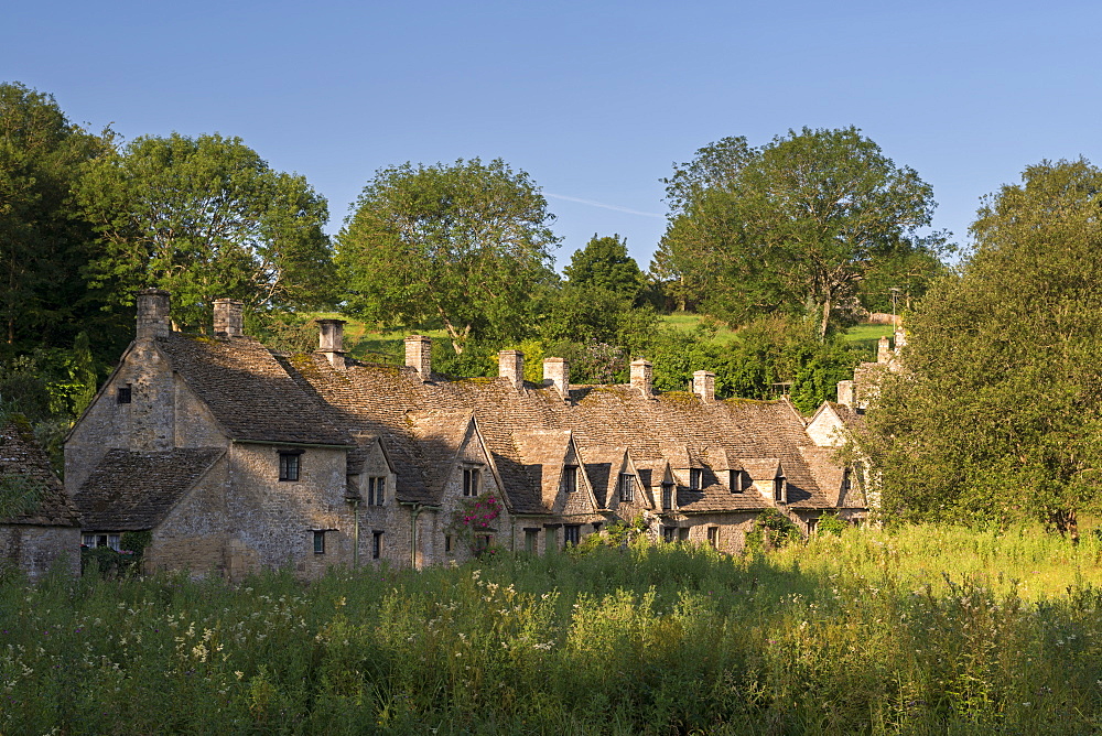 Arlington Row cottages in the Cotswold village of Bibury, Gloucestershire, England, United Kingdom, Europe