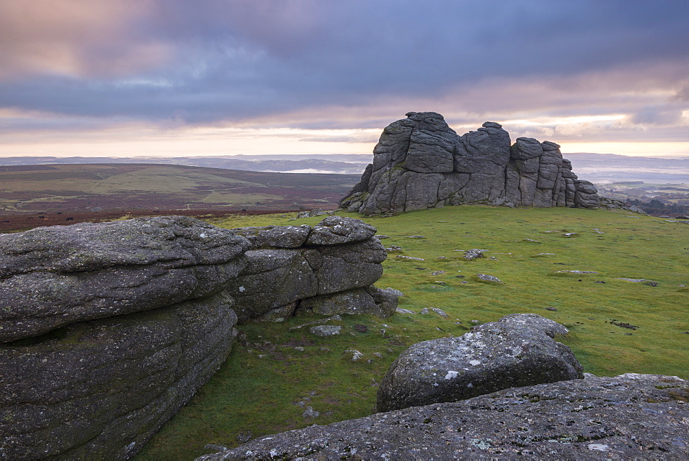 Colourful sunrise sky above Haytor, Dartmoor National Park, Devon, England, United Kingdom, Europe