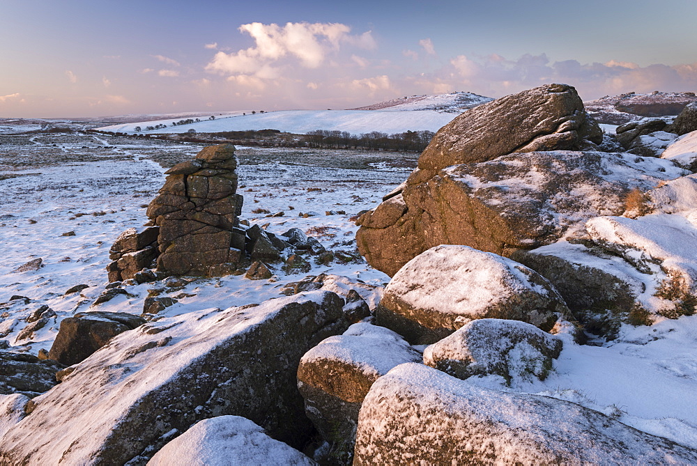 Snow dusted granite outcrops on Hound Tor, Dartmoor National Park, Devon, England, United Kingdom, Europe