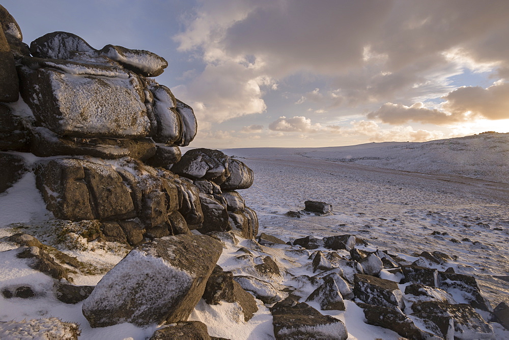 Snow covered granite tor and moorland, West Mill Tor, Dartmoor, Devon, England, United Kingdom, Europe