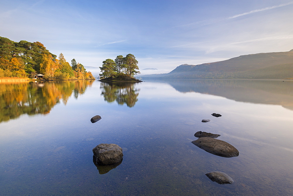 Reflections on Derwent Water on a sunny autumnal morning, Lake District National Park, Cumbria, England, United Kingdom, Europe