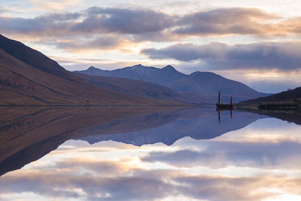 Reflections of mountains in Loch Etive at sunset, Glen Etive, Highlands, Scotland, United Kingdom, Europe