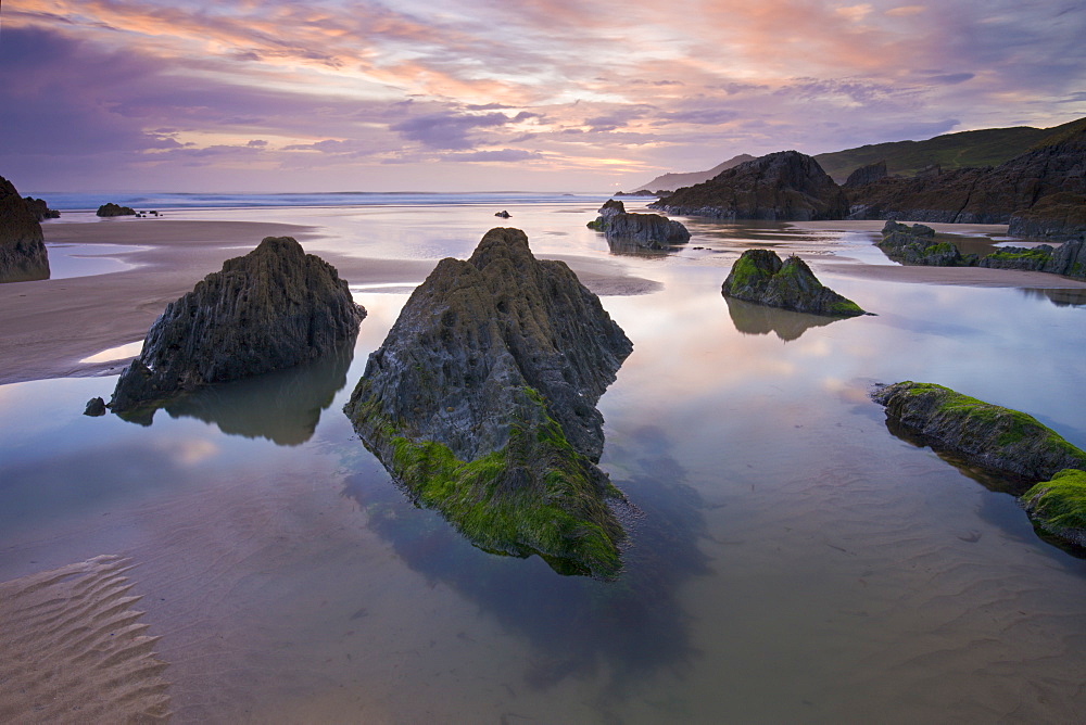 Rockpools exposed at low tide, Combesgate Beach, Devon, England, United Kingdom, Europe