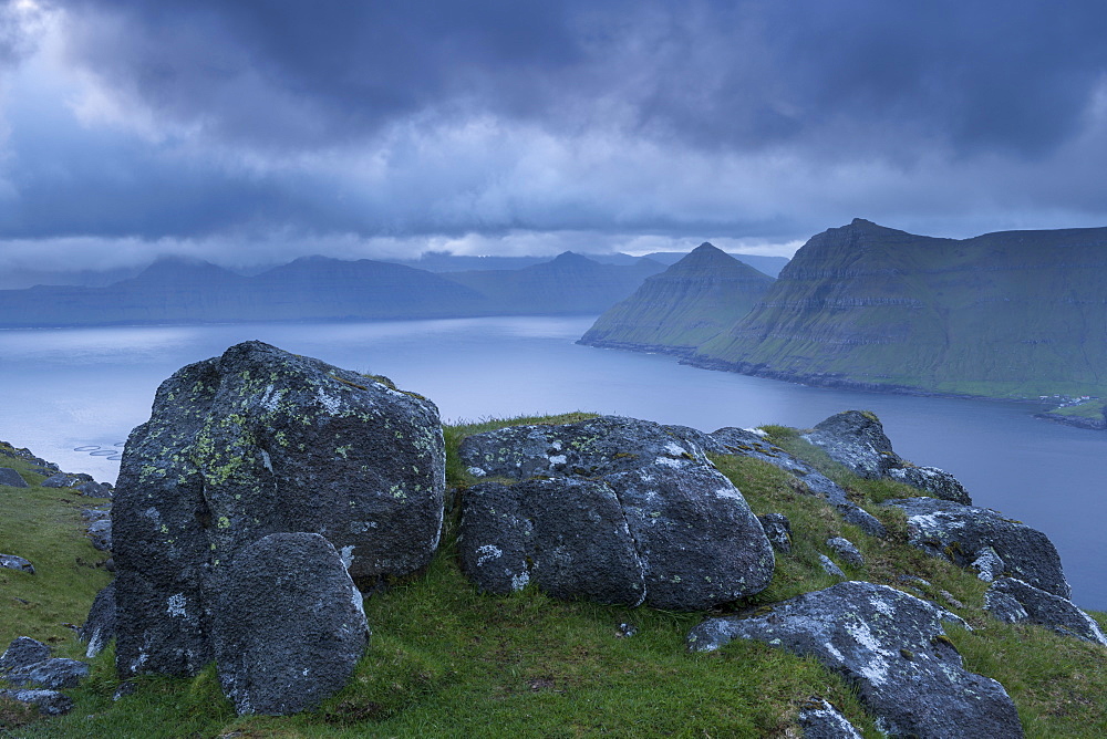 Stormy skies over Funningsfjordur at dawn, Eysturoy, Faroe Islands, Denmark, Europe