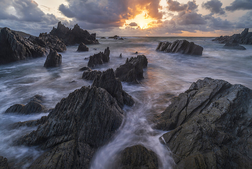 Sunset above the dramatic rocky coast of North Devon, England, United Kingdom, Europe