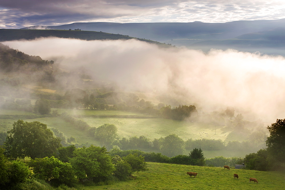 Mist hangs low in the valleys near Bwlch, Brecon Beacons National Park, Powys, Wales, United Kingdom, Europe