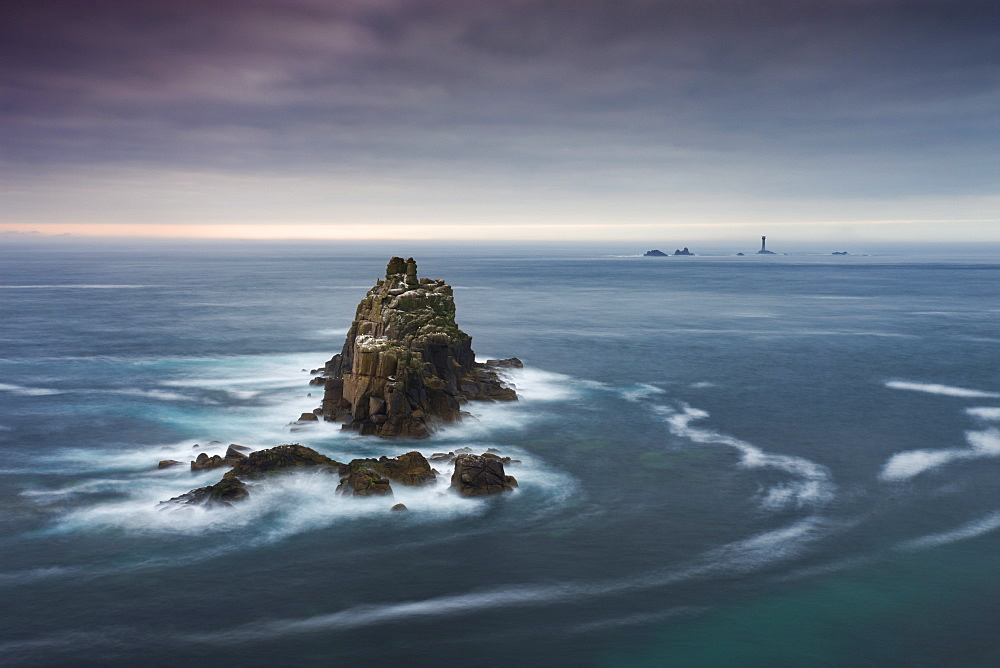 The Armed Knight rock stack and Longships Lighthouse off the coast at Land's End, Cornwall, England, United Kingdom, Europe