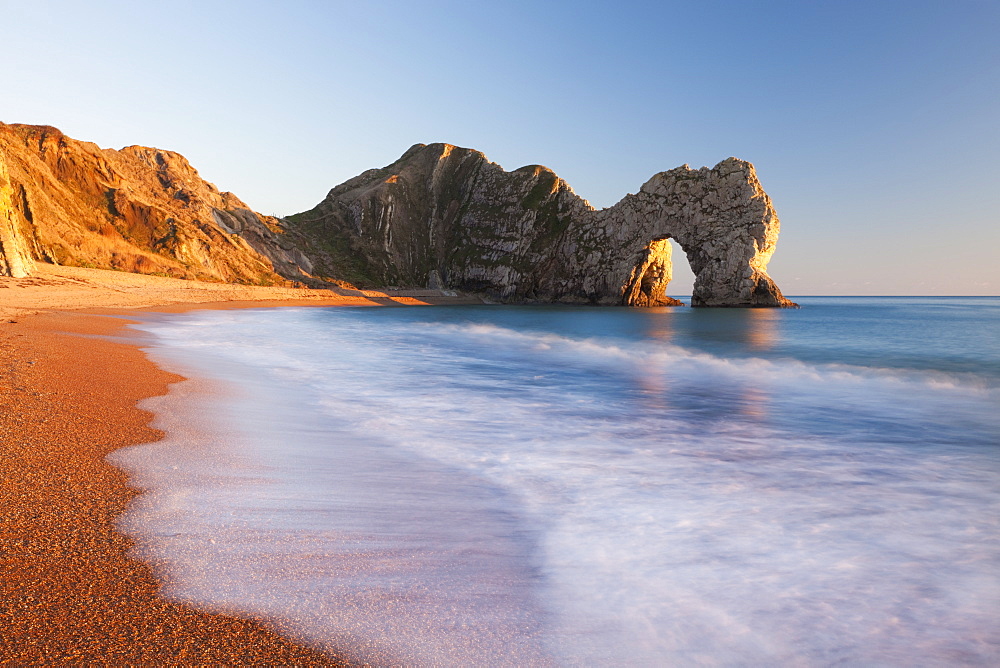 Durdle Door beach on a gorgeous sunny evening, Jurassic Coast, UNESCO World Heritage Site, Dorset, England, United Kingdom, Europe