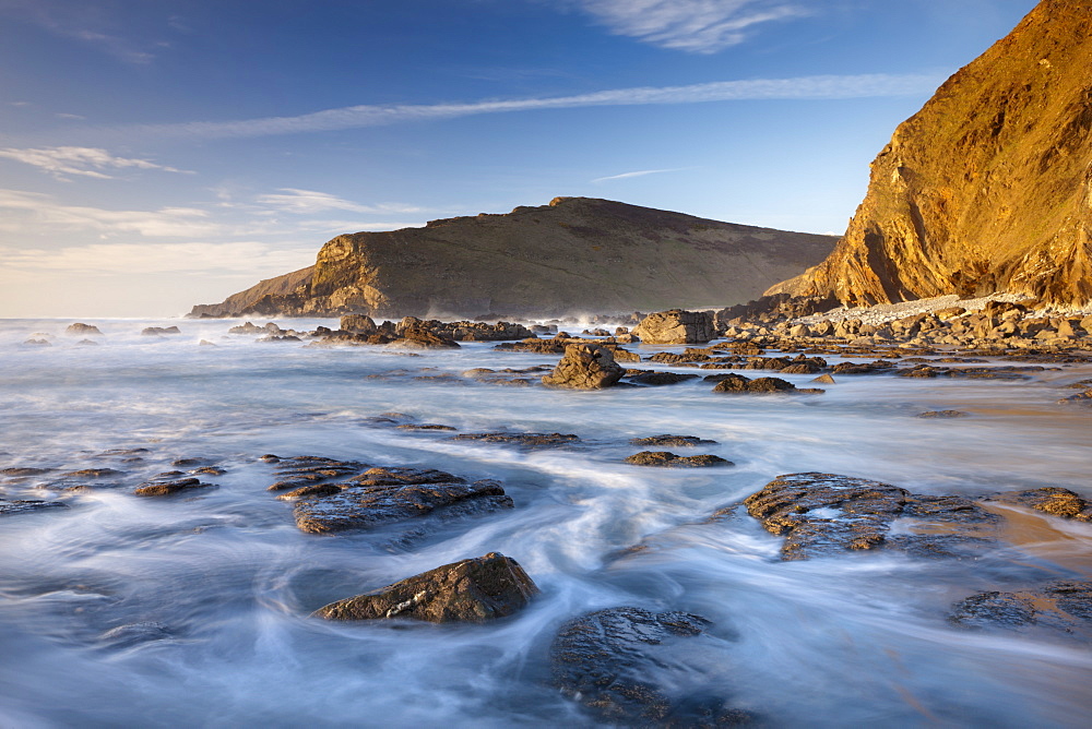 High tide floods the rocky ledges of Duckpool beach on the North Cornish coast, Cornwall, England, United Kingdom, Europe