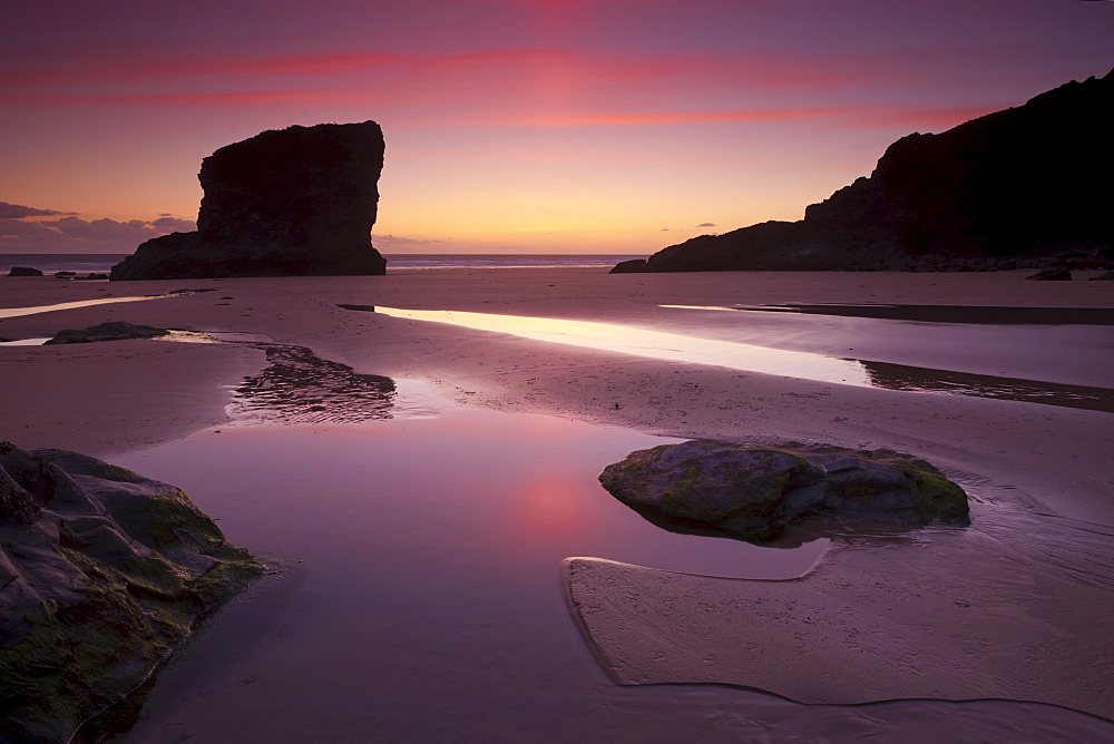 Twilight on the sandy beach at Bedruthan Steps, North Cornwall, England, United Kingdom, Europe