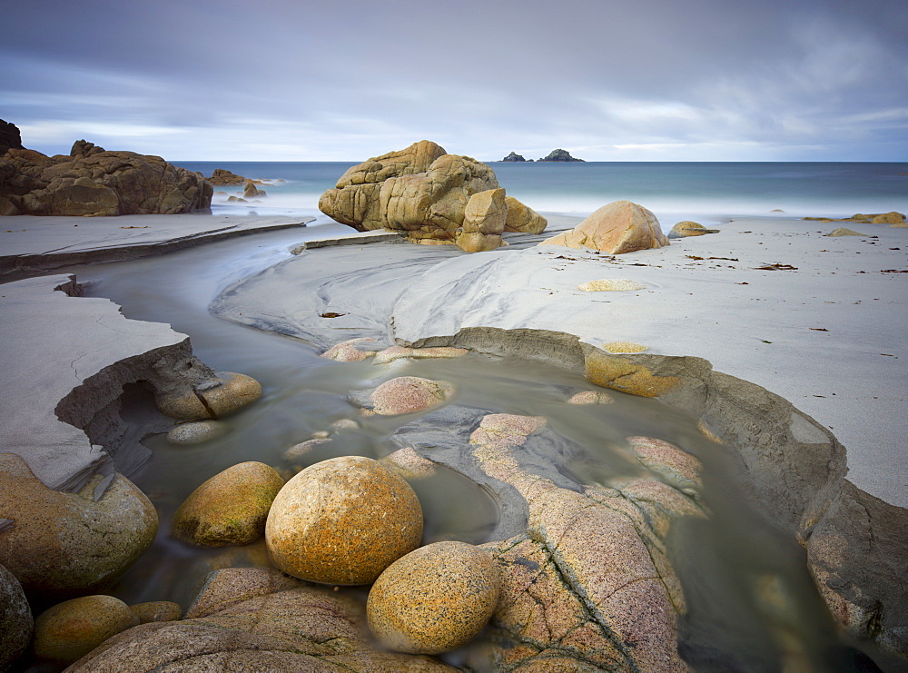 Beautiful boulders on the sandy beach at Porth Nanven near Land's End, Cornwall, England, United Kingdom, Europe