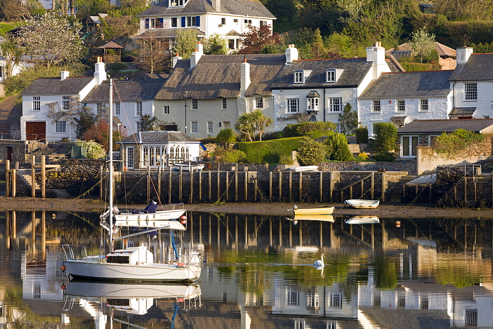 Cottages and boats beside the River Yealm at Newton Ferrers, South Hams, Devon, England, United Kingdom, Europe