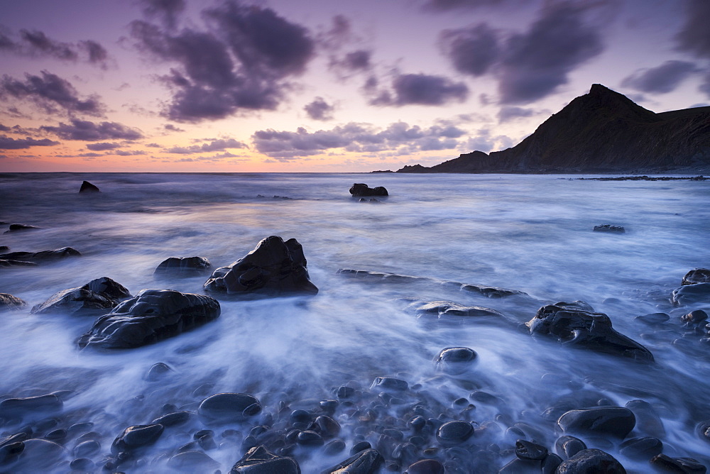 Dusk on the rocky shores of Speke's Mill Mouth in North Devon, England, United Kingdom, Europe