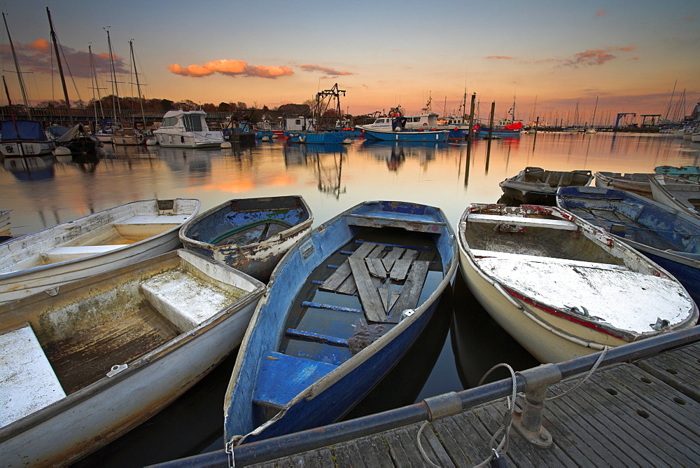 Boats tied up in Lymington harbour at sunset, Lymington, Hampshire, England, United Kingdom, Europe