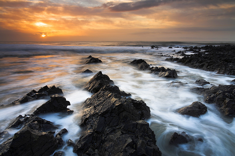 The rugged Gower coast greets a rapidly rising tide, South Wales, Wales, United Kingdom, Europe